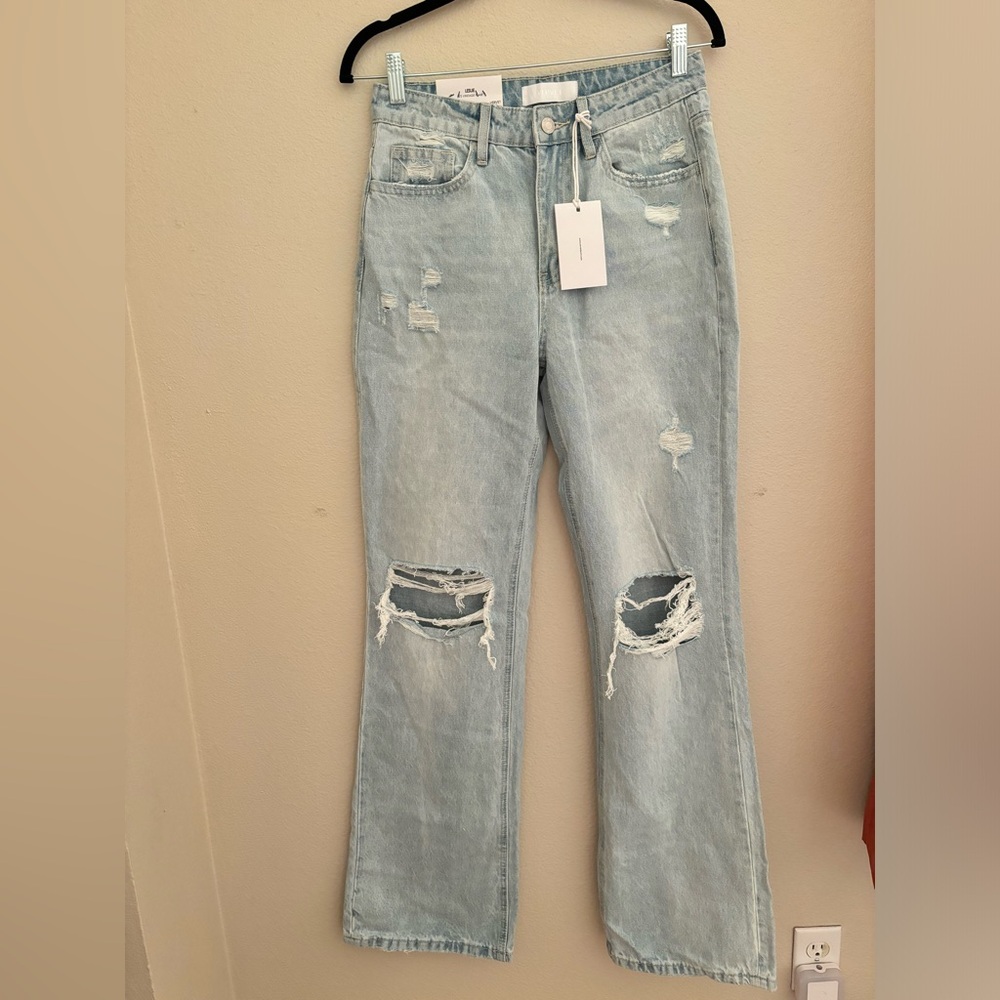 Slight Flare Blue Ripped Jeans
